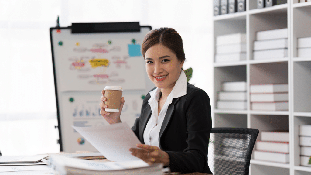 Professional reviewing financial documents as part of a daily money management habit