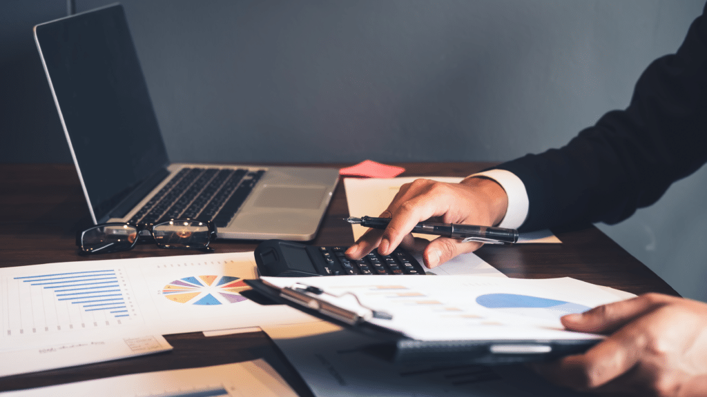 Financial professional reviewing reports to improve accounts receivable performance and business cash flow