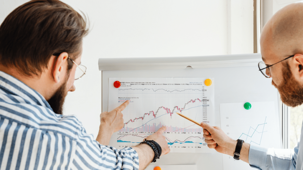 Professionals analyzing top and low-performing products in office setting