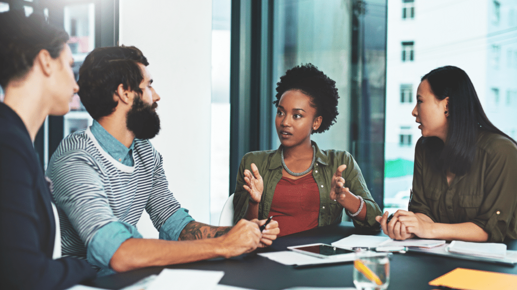 Employees discussing product sales and performance analytics