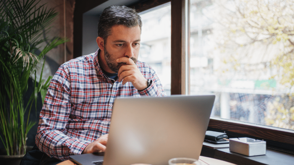 Business owner analysing finances and planning strategies to overcome profit and cash flow challenges