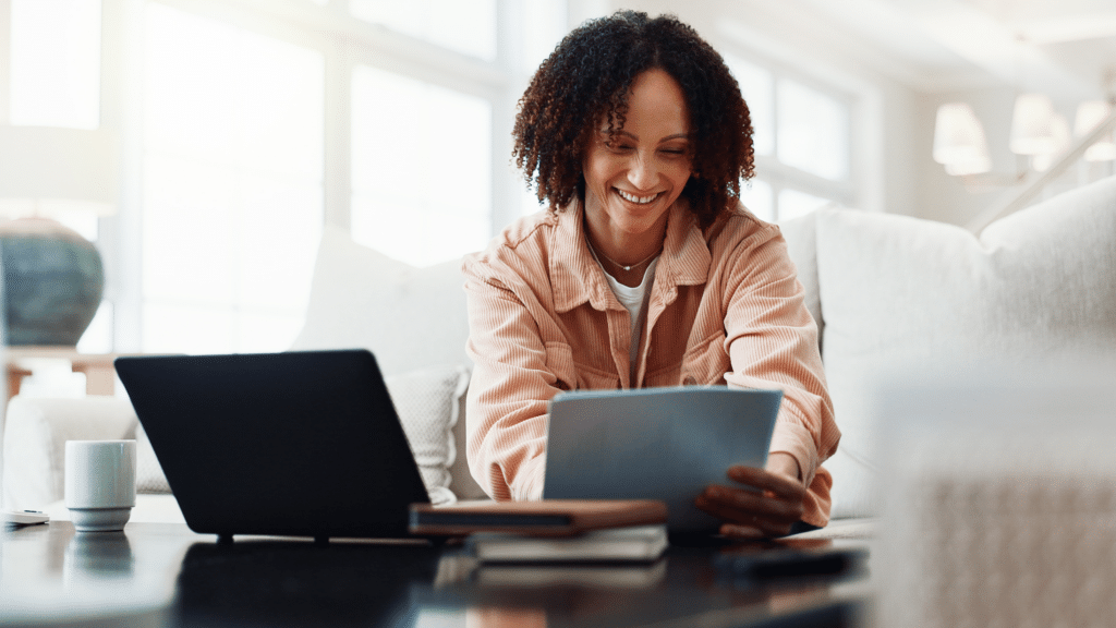Business professional reviewing financial documents and reports to identify financial statement issues.